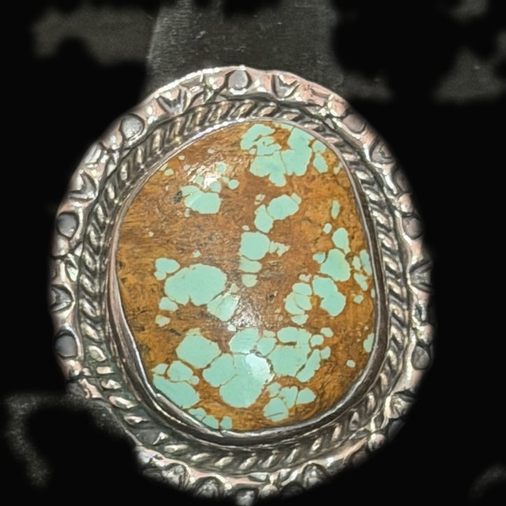 Genuine Turquoise Oval Ring — unusual oval where golden-tan host stone blooms with mint-green turquoise spots