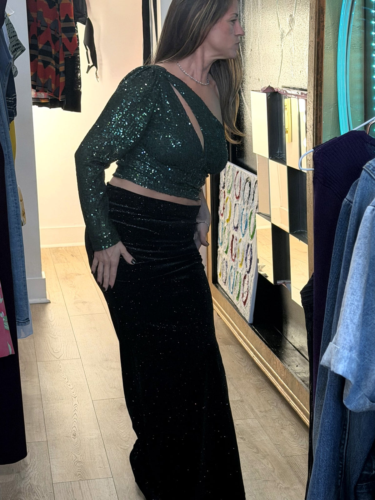 Black glitter velvet maxi skirt worn with the emerald sequin crop top