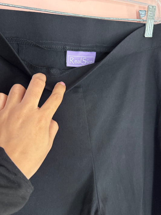 Real Size brand label close-up at the waistband
