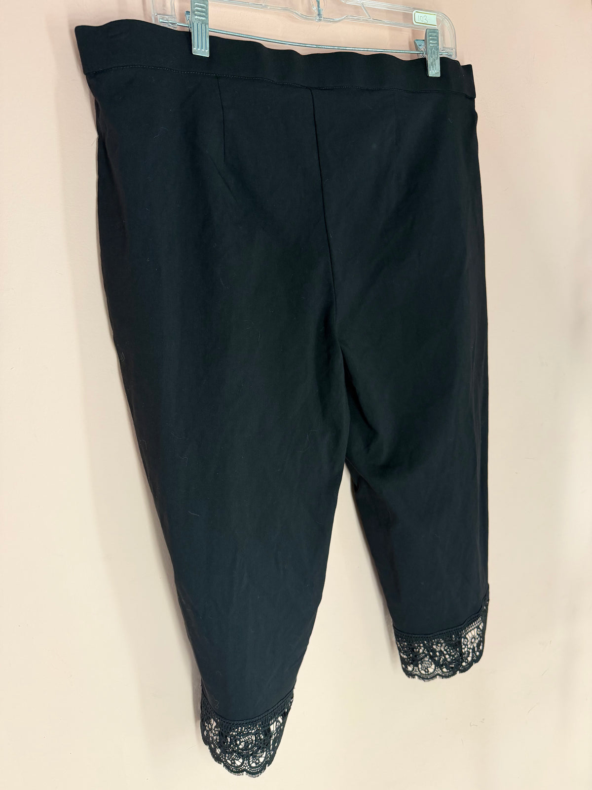 Real Size black lace-hem capri leggings, full view at a slight angle