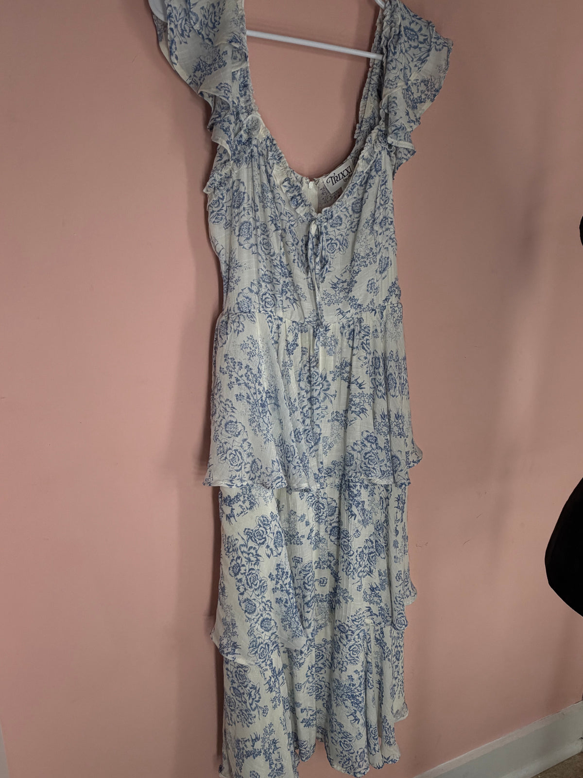 Blue and white floral tiered maxi dress with flutter sleeves, front view