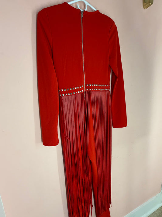 Red fringe jumpsuit, back view with exposed zipper and studded waistband