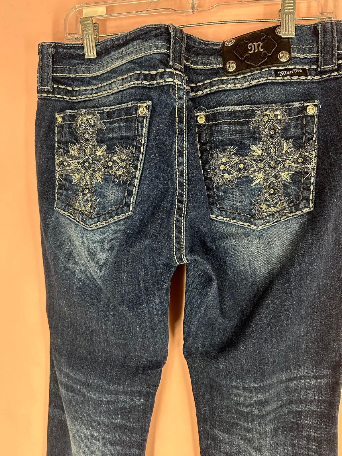Detail view of embroidered Skinny Jeans for Women, Dark Wash Cross Pockets, Miss Me