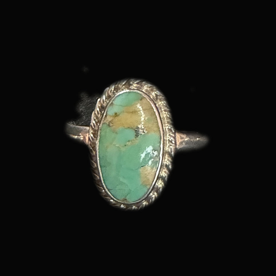 Genuine Turquoise Oval Ring — green turquoise oval with golden-brown matrix in soft patches