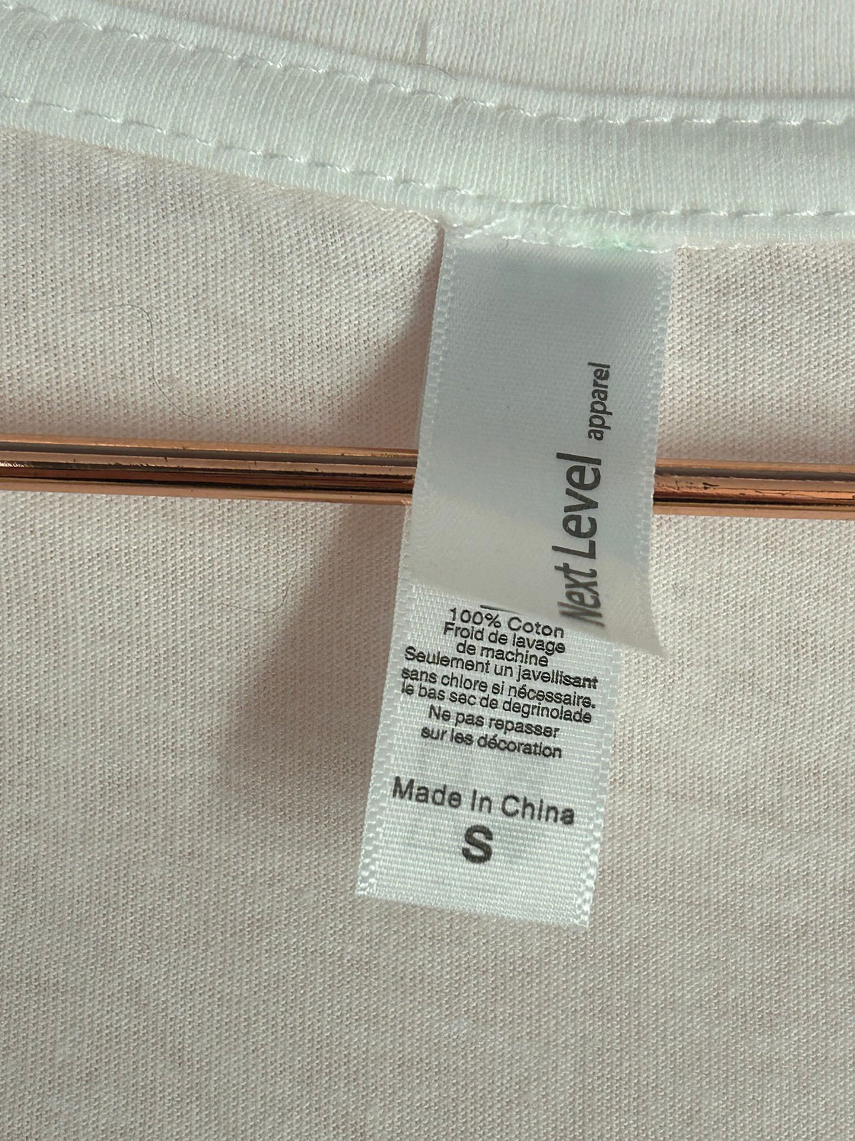 Label view of v-Neck Tee for Women, 'Good Lord and a Gun', The Wooly Wagon