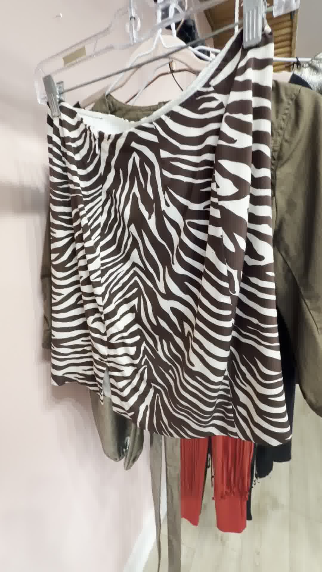 Brown and white zebra stripe skirt.