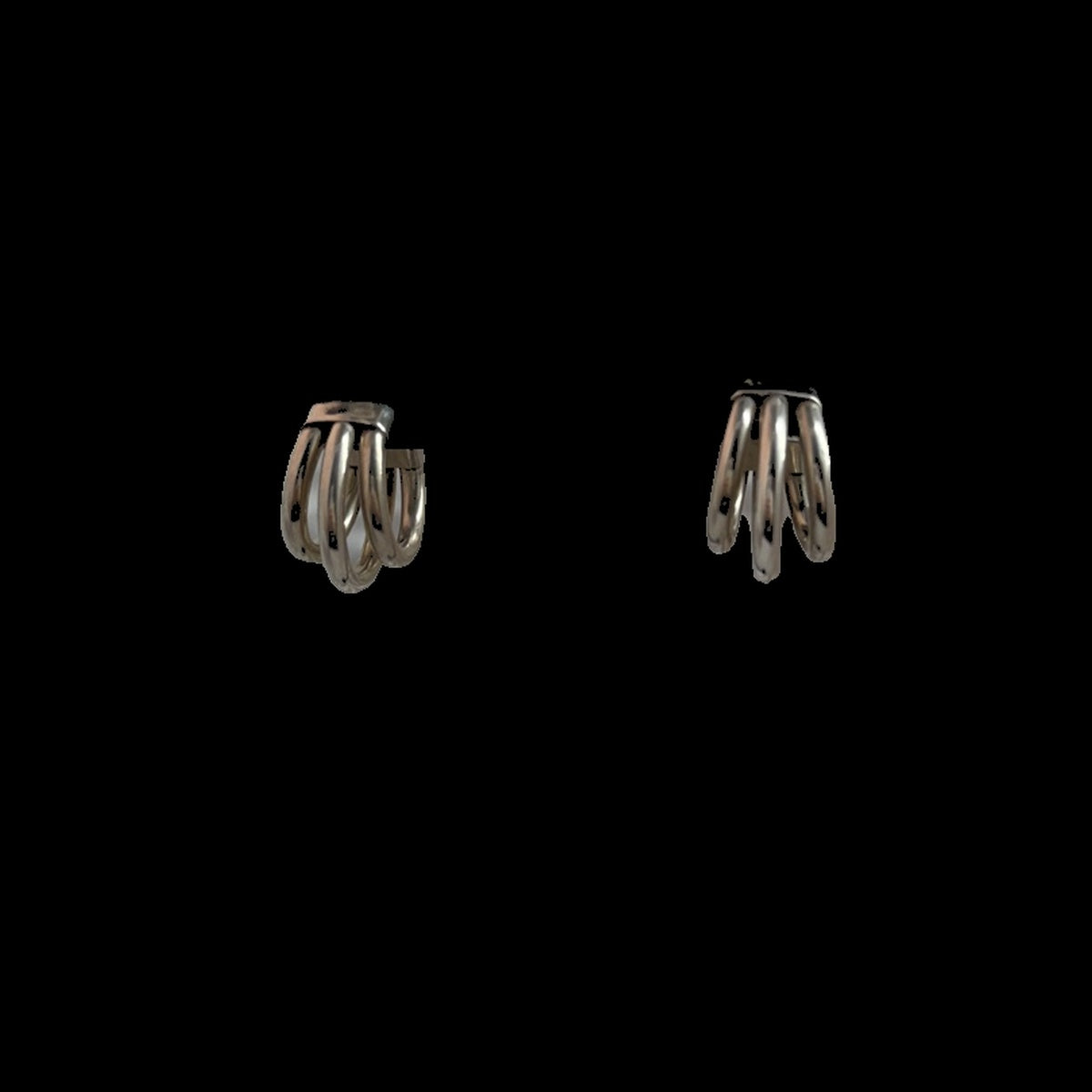 Triple-hoop sterling silver stud earrings on black background