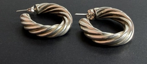 Polished twisted rope hoop earrings, side view