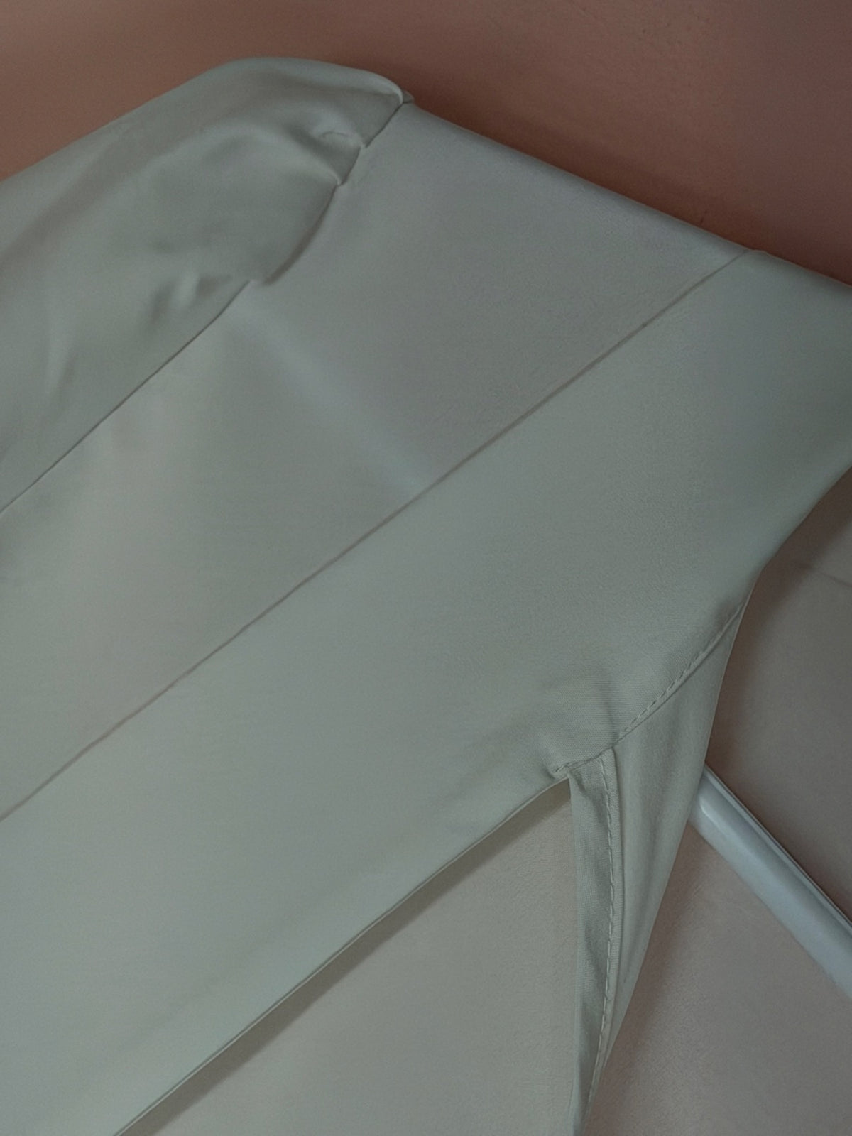 Sleeve and fabric detail on the M.M.Z ivory blouse