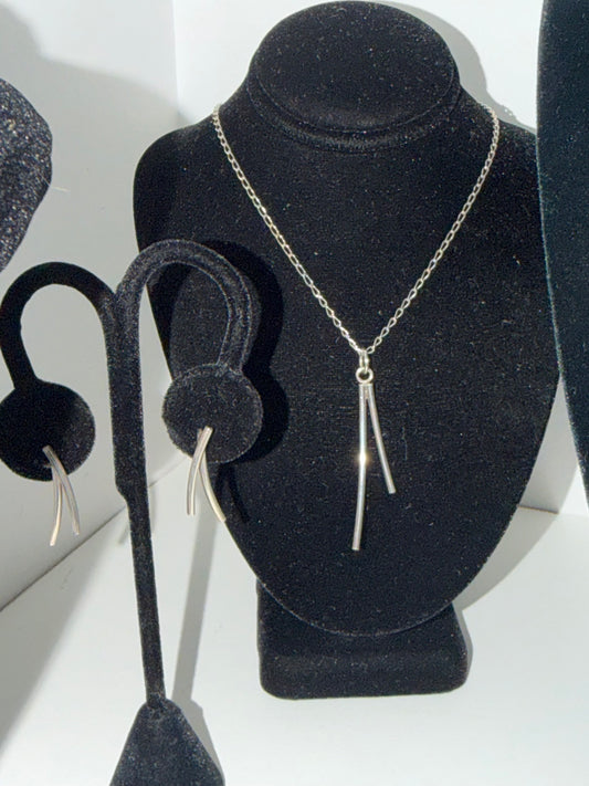 Sterling silver double-bar necklace and matching earrings set on display — Regul Silver