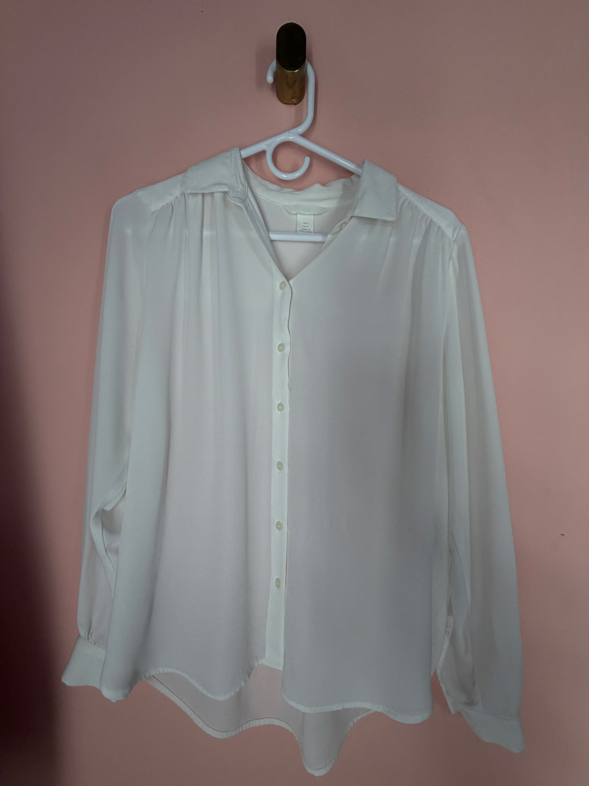 H&M white sheer button-up blouse, full front view