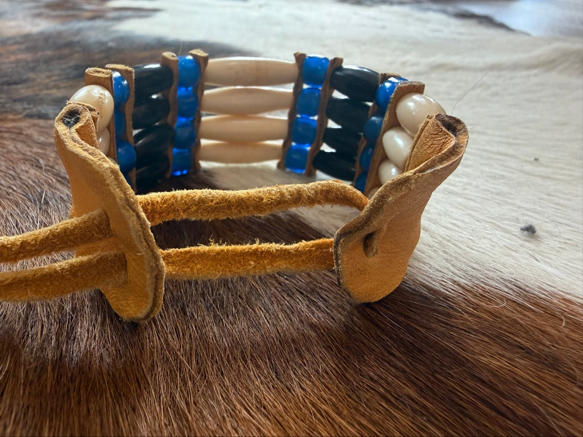 Side view and leather tie fastener on Southwest by Design hairpipe bracelet