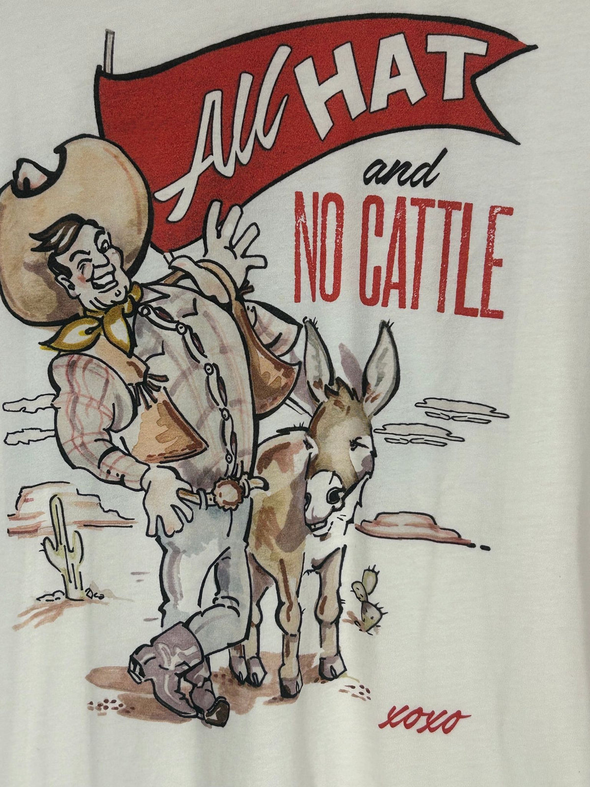 Detail view of western Graphic Tee for Women, 'All Hat and No Cattle' Cartoon Cowboy