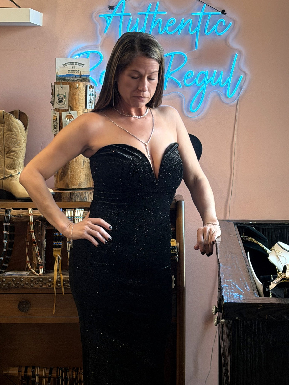 Black glitter velvet strapless plunge gown worn, three-quarter view