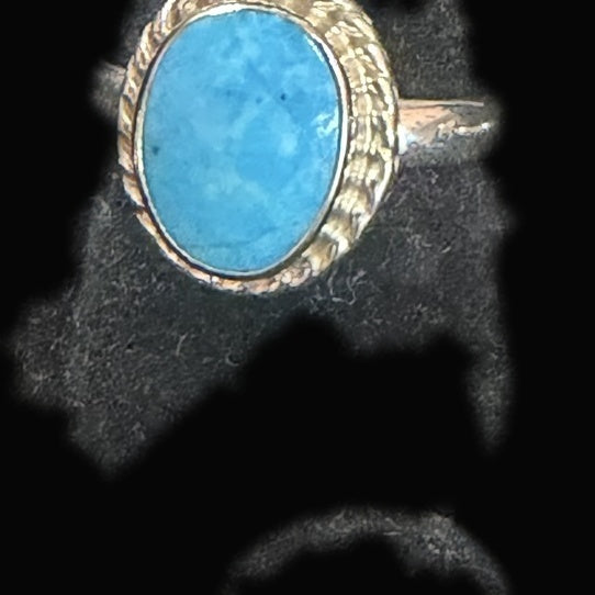 Genuine turquoise oval ring with twisted rope bezel in sterling silver, bright sky blue stone