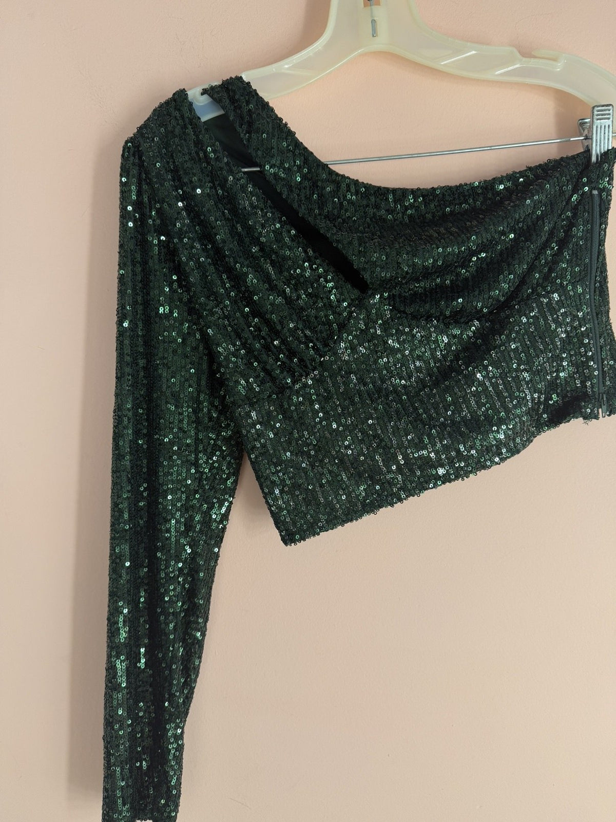 Chocolate U.S.A. emerald green sequin one-shoulder crop top on hanger