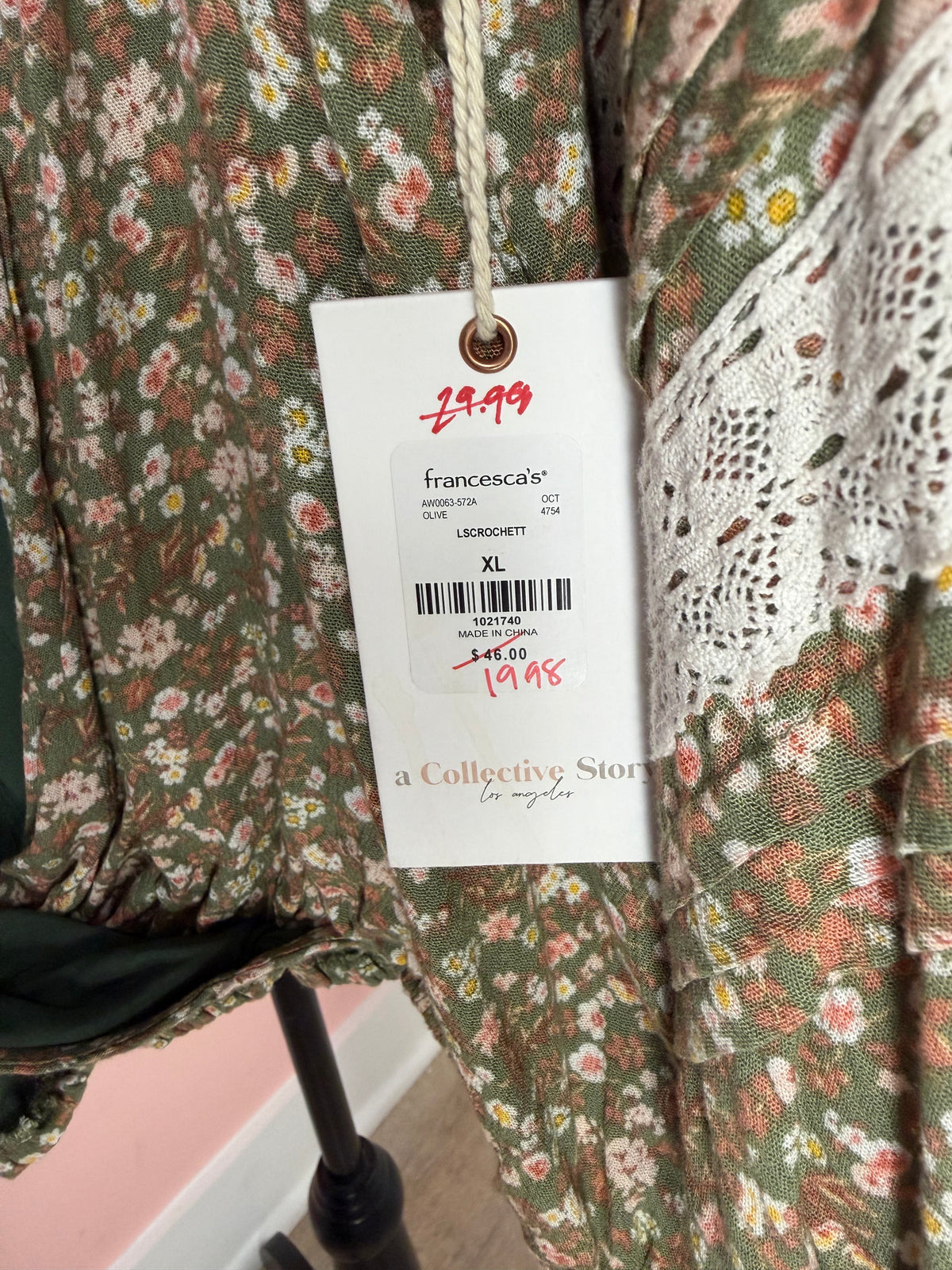 francesca's brand price tag close-up showing original retail $46 and size XL