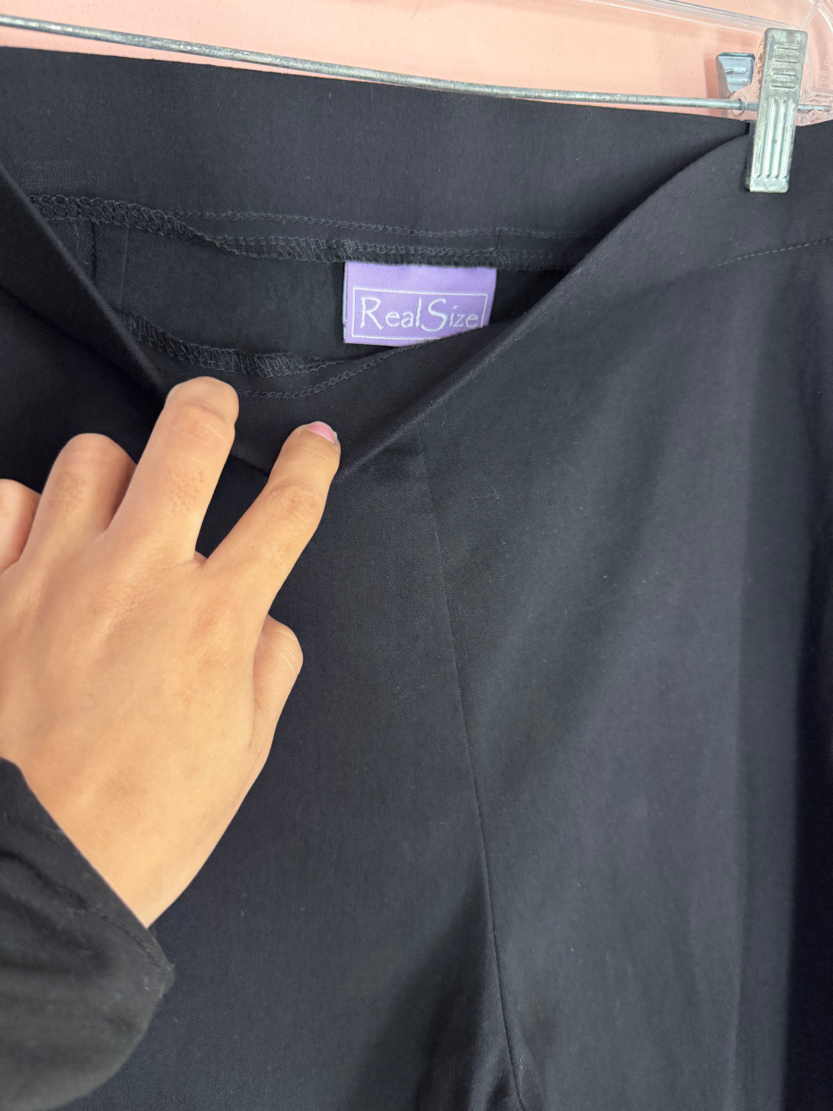 Real Size brand label close-up at the waistband