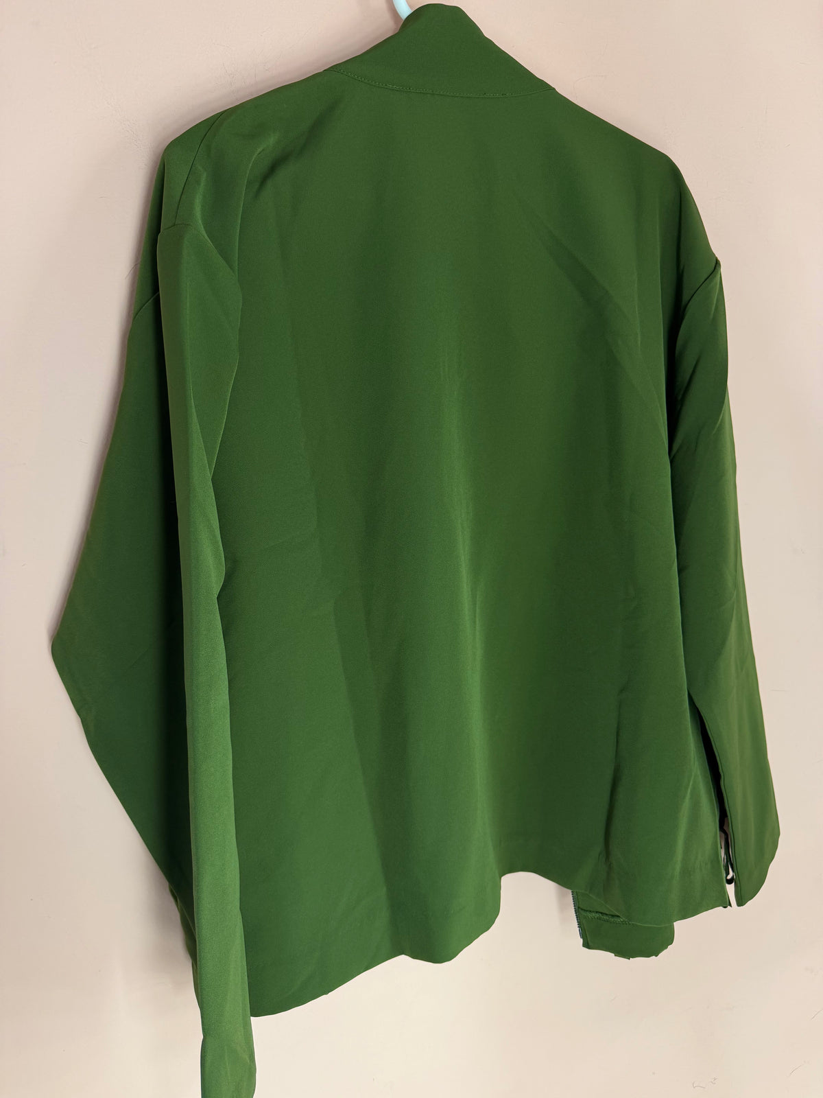 Truth + Style olive fringe hem jacket, back view