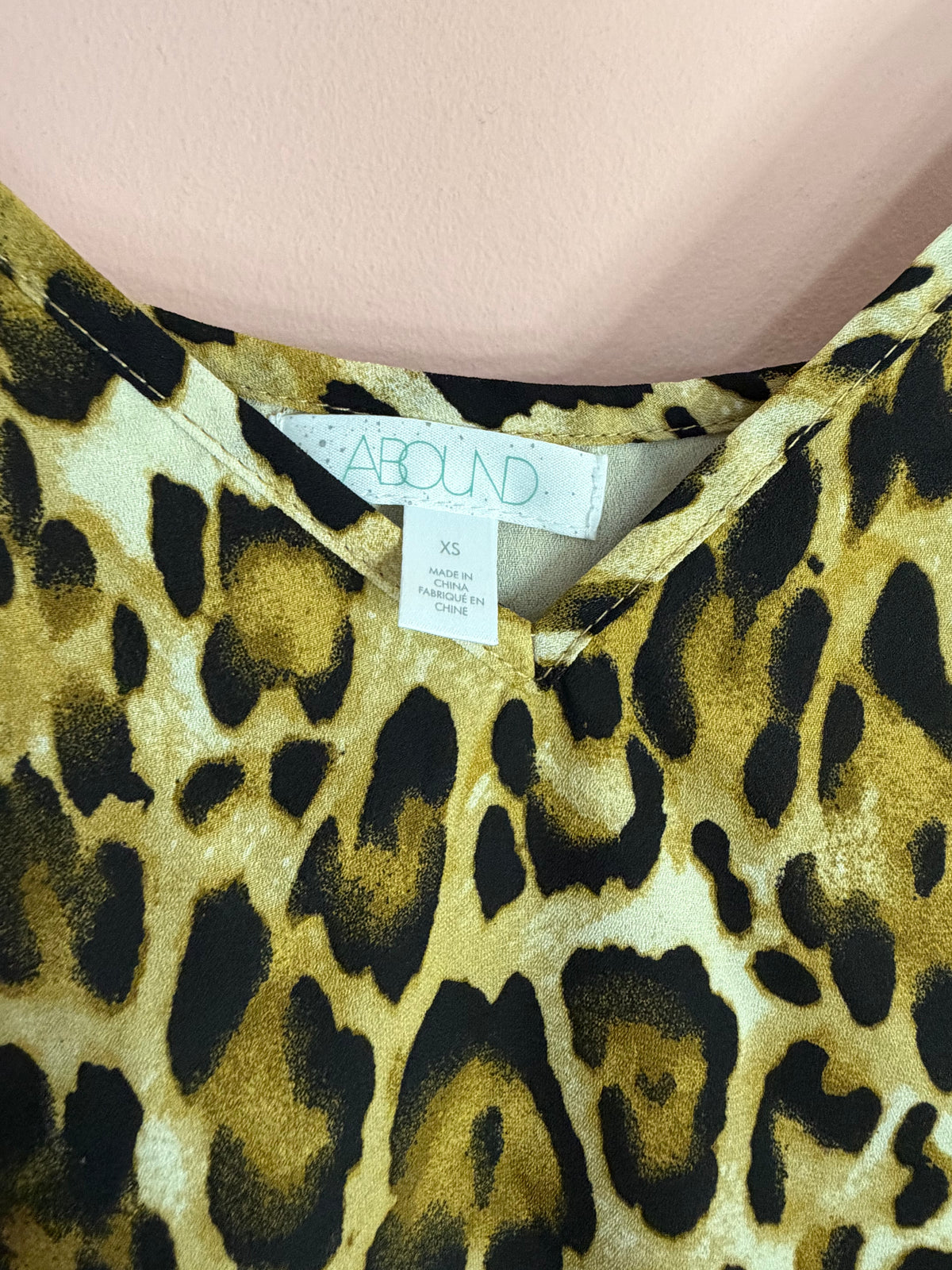 Abound brand label close-up, size XS