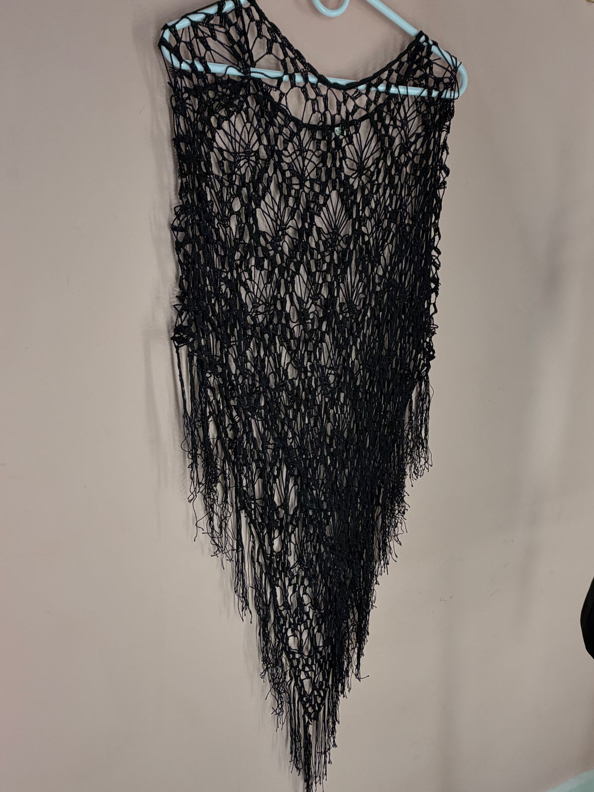Black open-crochet shawl with long fringe, full view