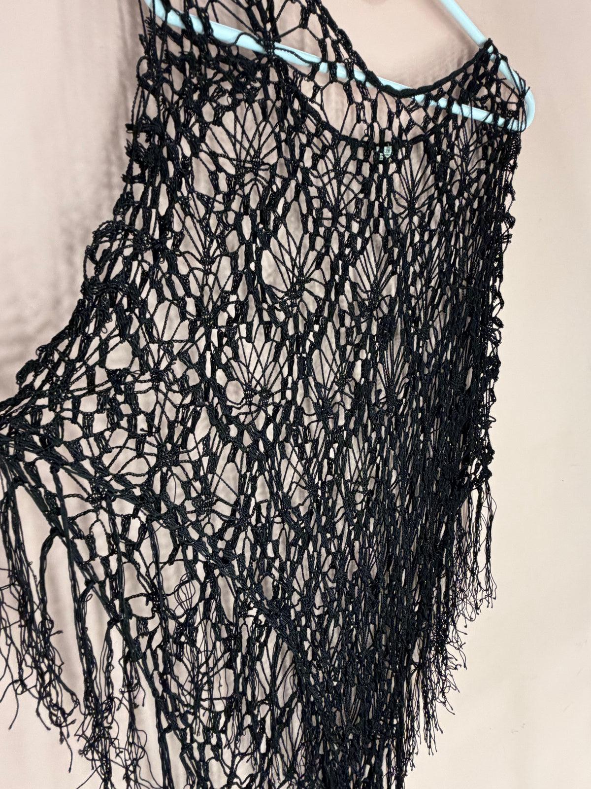 Black crochet shawl weave detail close-up