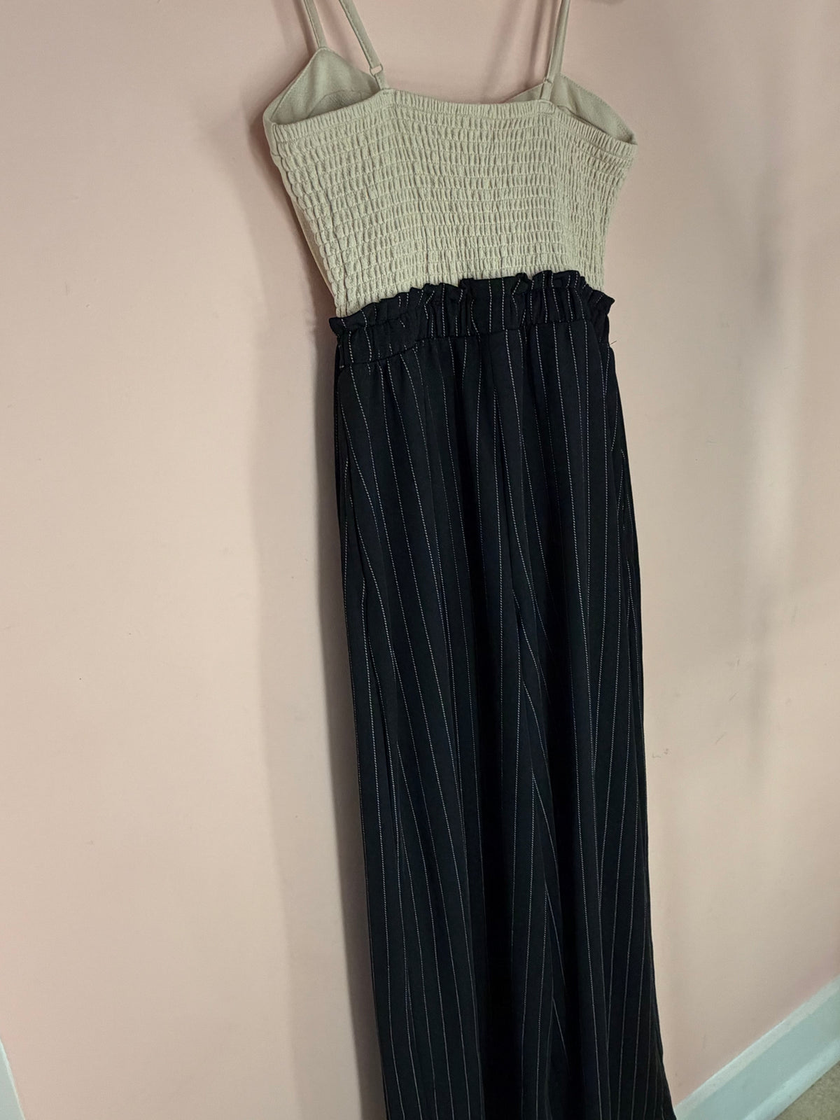 No Comment two-tone jumpsuit, back view with smocked bodice back