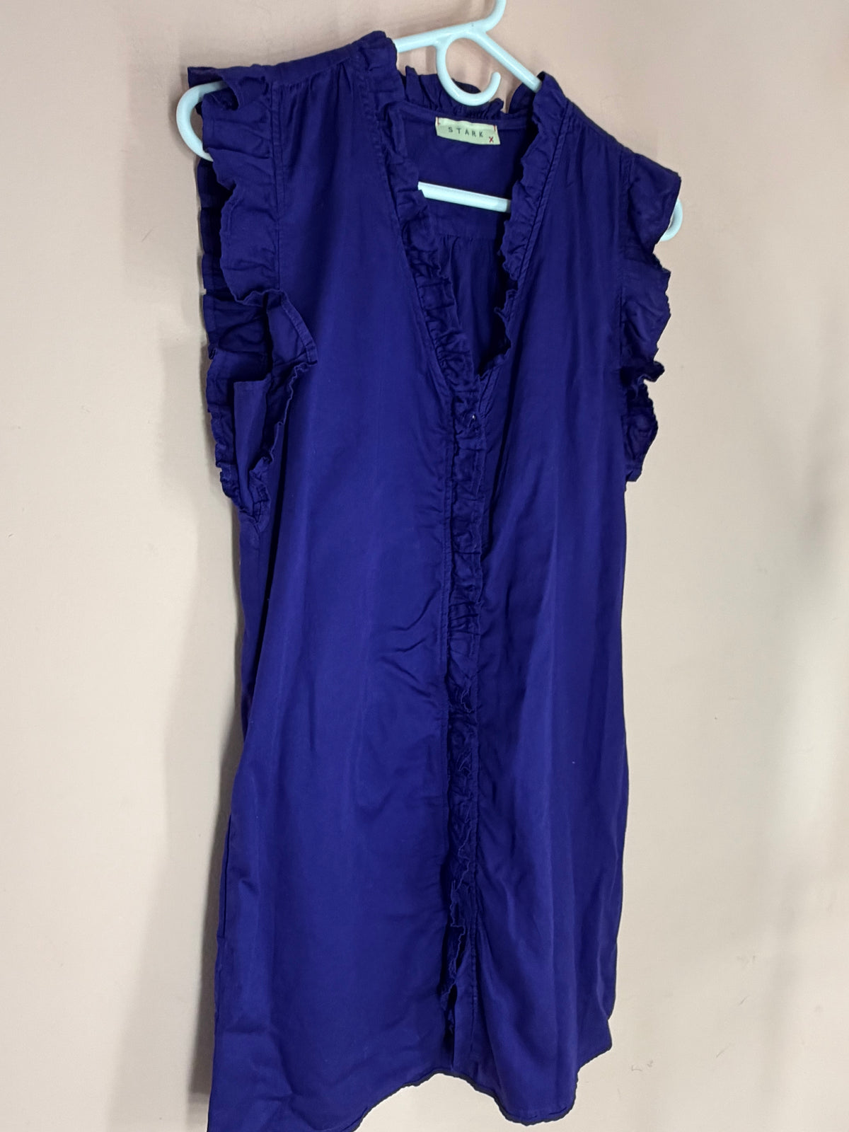 STARKx royal purple sleeveless dress with ruffled V-neckline, front view