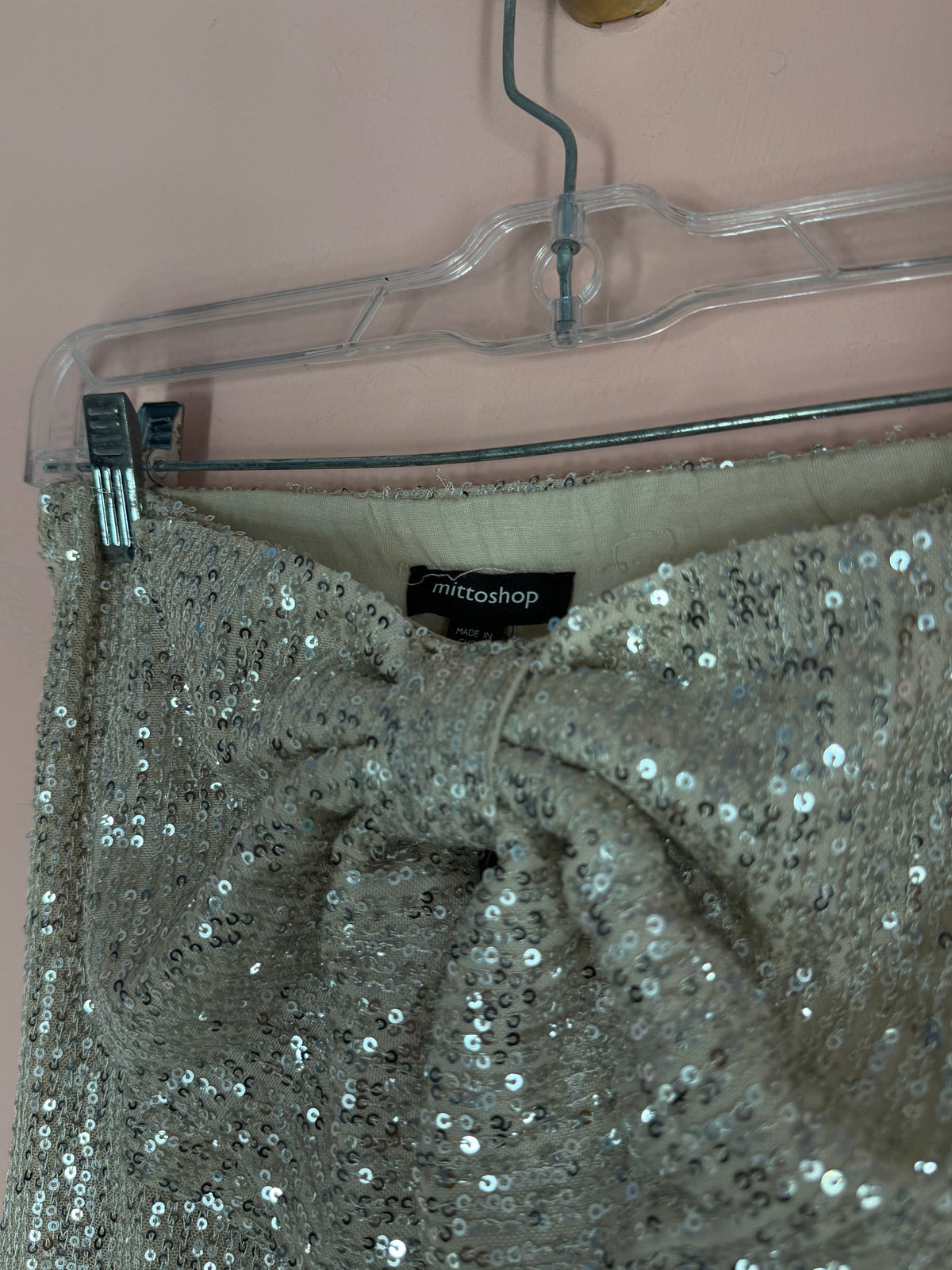 Mittoshop brand label close-up