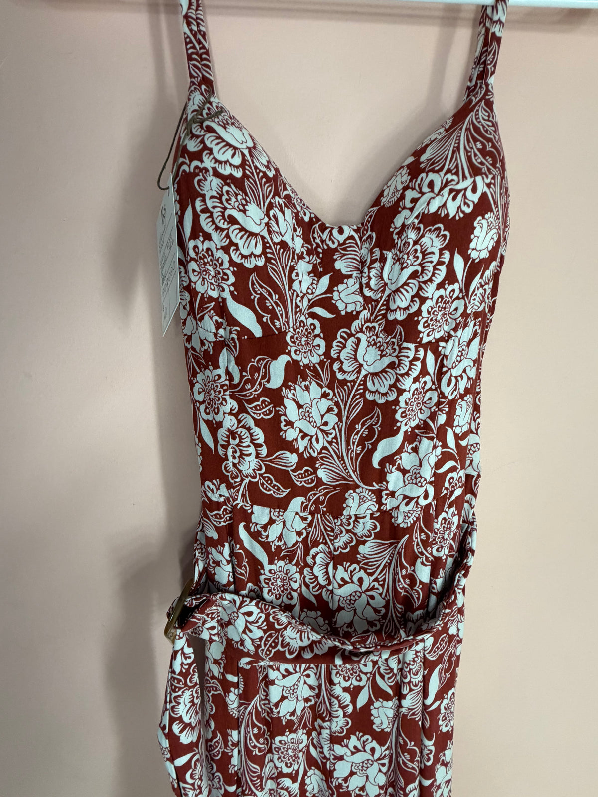 Rust and white floral jumpsuit, bodice close-up