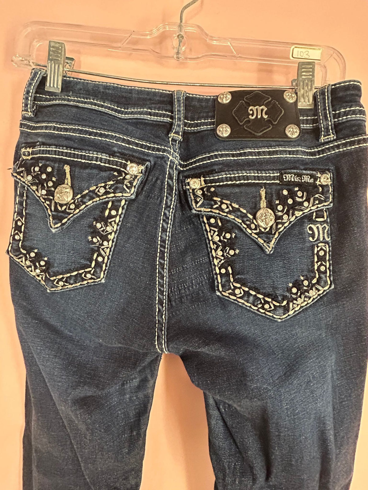 Back view of embellished Bootcut Jeans for Women, Faded Black Gold Rhinestone Pockets, Miss Me