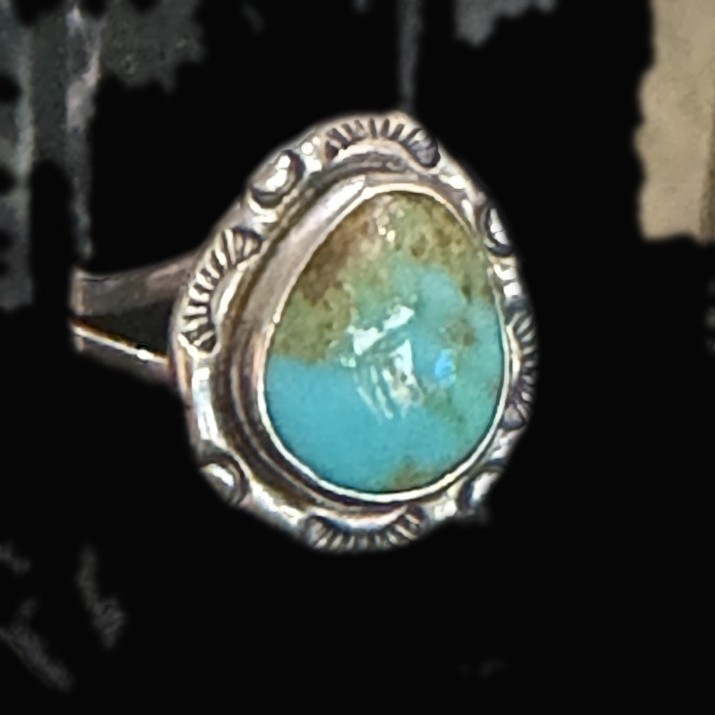 Genuine Turquoise Oval Ring — oval stone with olive-brown matrix mottling over bright sky blue