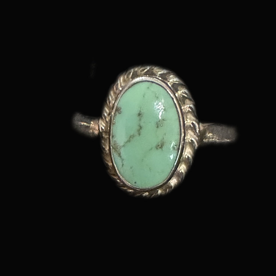 Genuine Turquoise Oval Ring — minty-green oval traced with a fine dark matrix vein