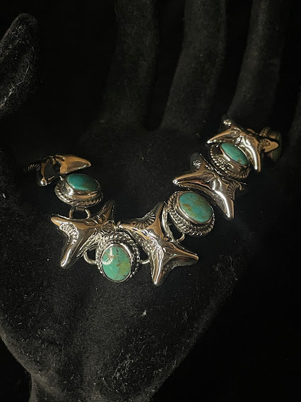 Back view of handcrafted Genuine Turquoise and Sterling Silver Necklace, Bracelet, Earrings, and Ring Set