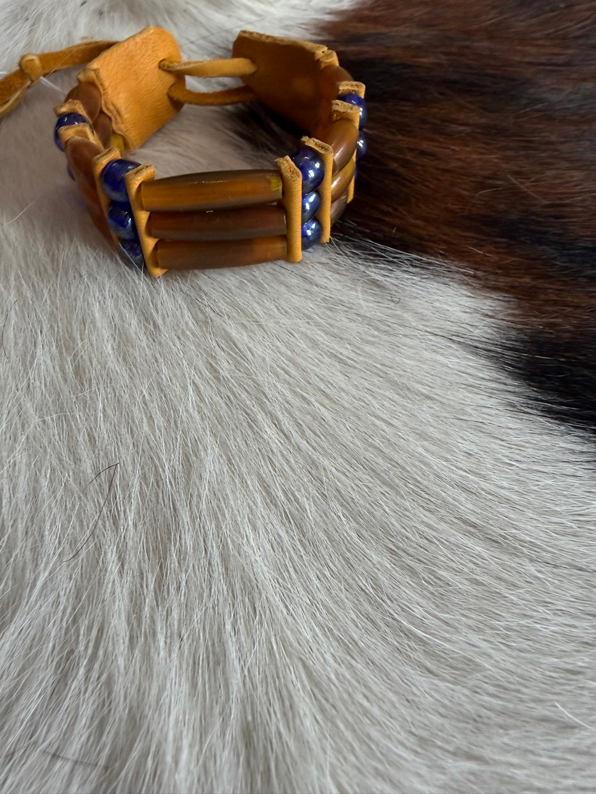 Amber bone hairpipe bracelet by Southwest by Design on cowhide