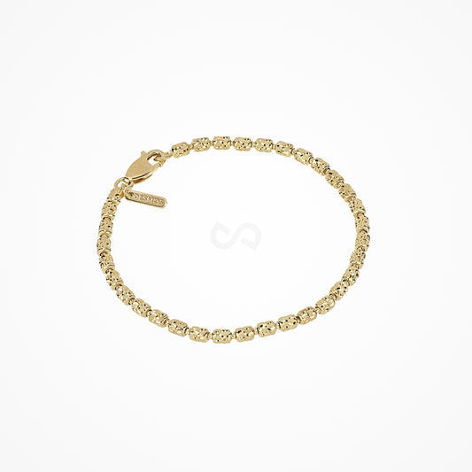Long barrel link bracelet with 18K gold plate in a full oval on white, dimpled barrels, clasp and tag at upper left
