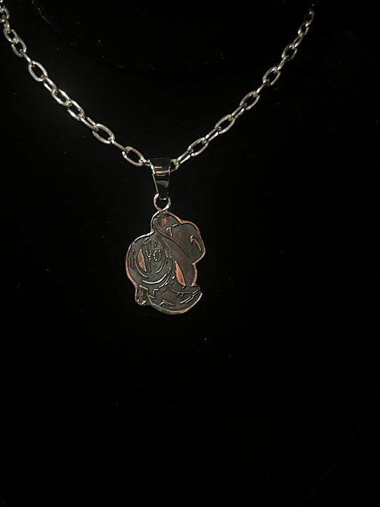 Cowboy hat necklace — front view of the lasered boots, rope and hat pendant in sterling silver on black