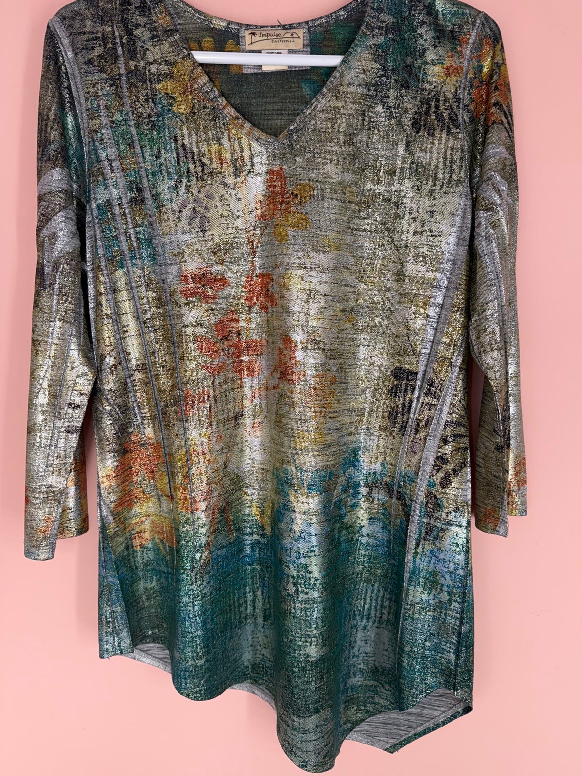 Impulse California metallic floral tunic top, front view on hanger