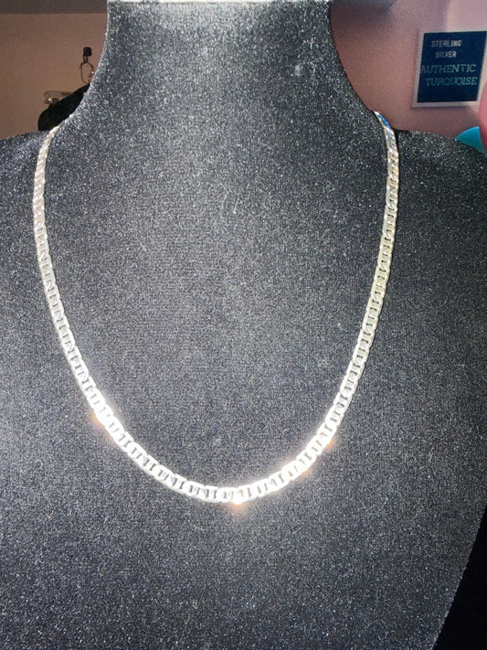 Fine curb chain necklace in sterling silver on a black bust