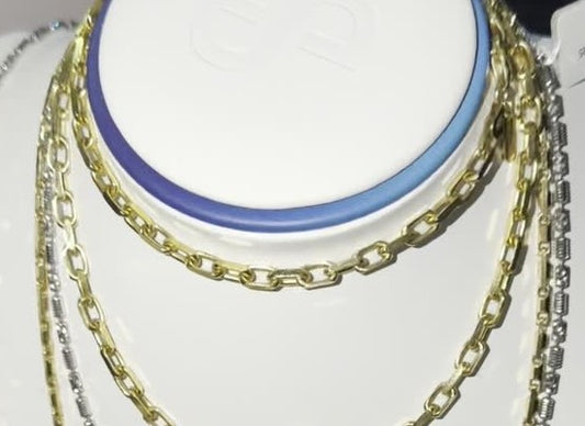 DESMOS elongated link chain necklace in 18k gold-plated sterling silver, photographed in the DESMOS case at Regul Silver
