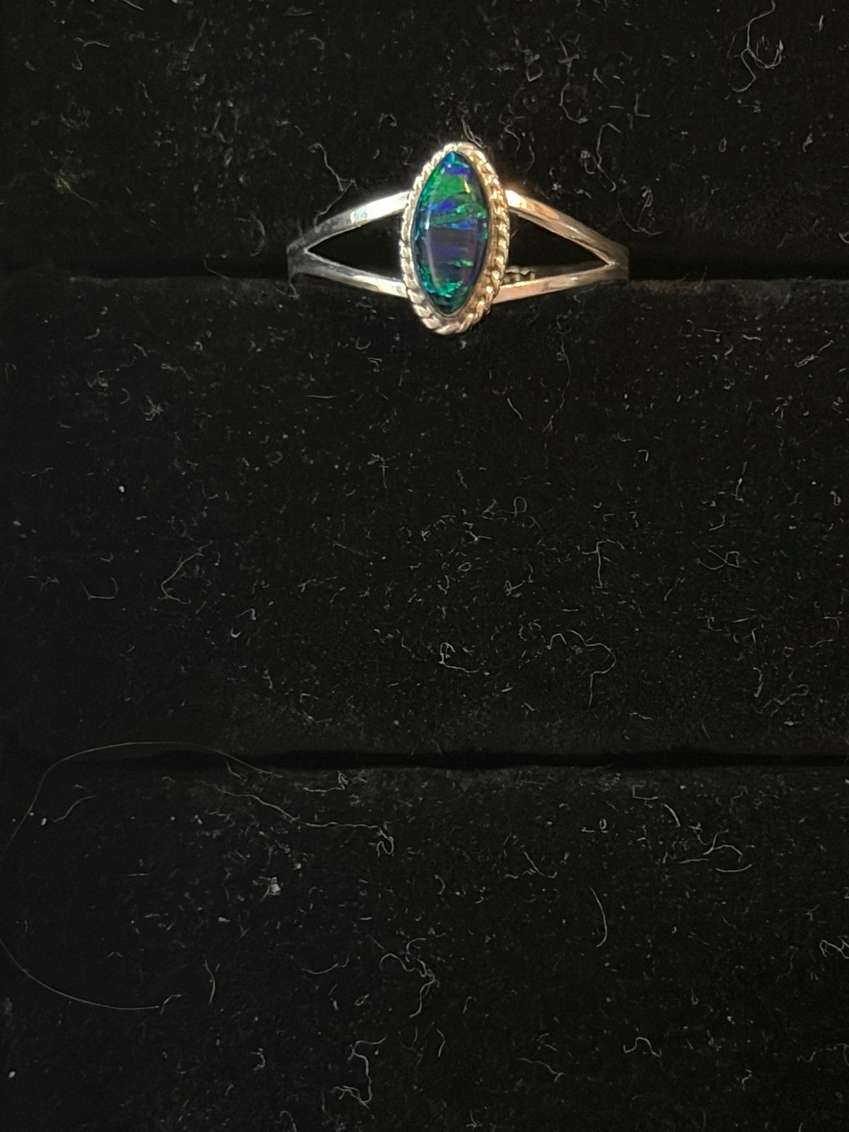 Opalite ring — deep green marquise handmade opalite in a rope bezel on a sterling silver split shank