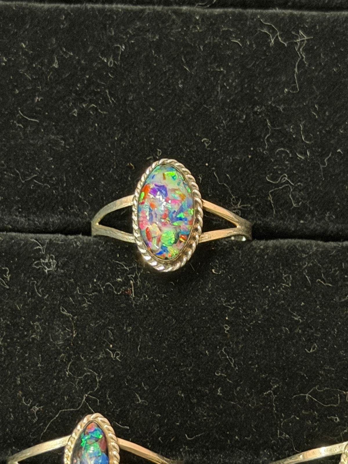 Opalite ring — kaleidoscope oval handmade opalite in a rope bezel on a sterling silver split shank