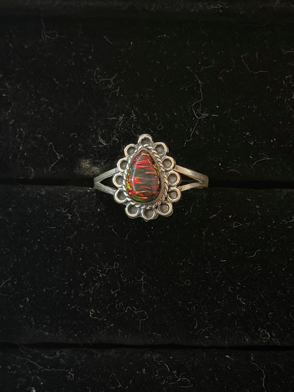 Opalite ring — dark red teardrop handmade opalite in a scallop bezel on a sterling silver split shank