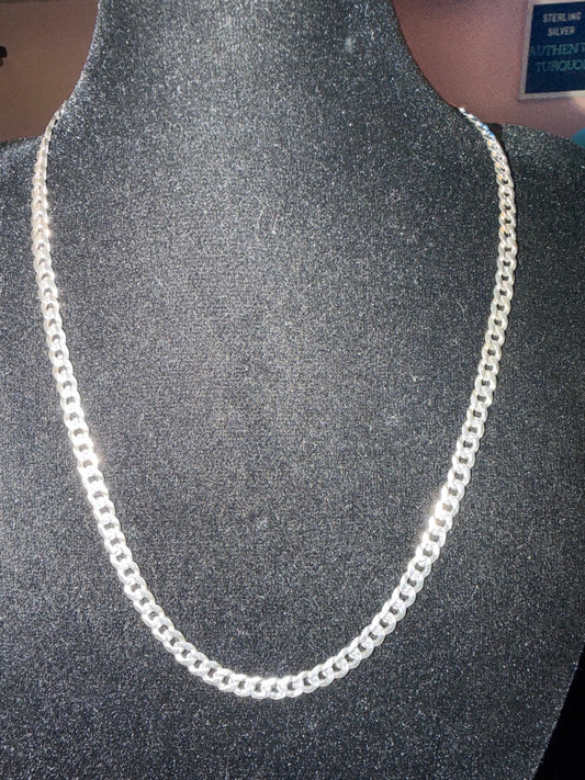 Rounded curb chain necklace in sterling silver on a black bust at Regul Silver
