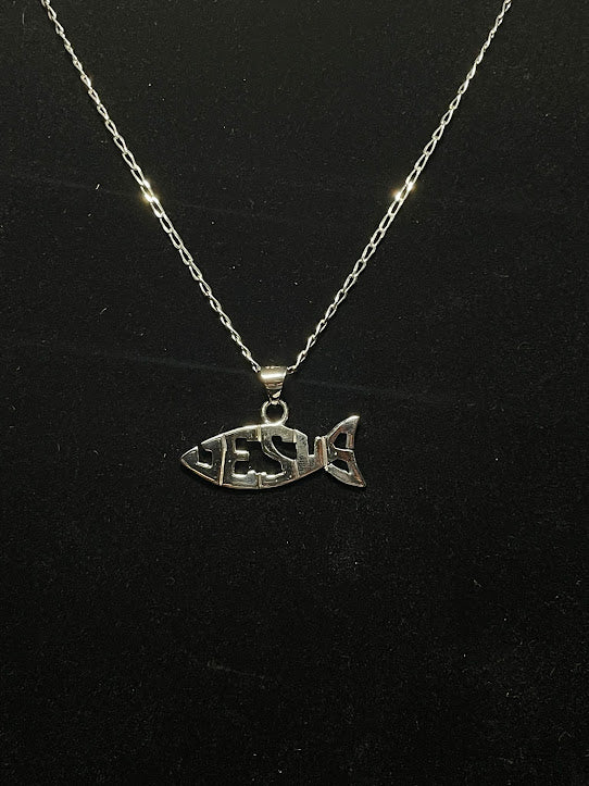 Sterling silver Jesus fish pendant in full view on black, the whole chain and the fish with JESUS cut through it