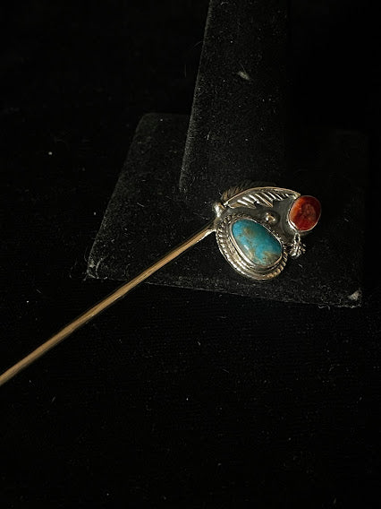 Turquoise and spiny oyster hat pin — the feather silverwork pin, a turquoise oval and a small red spiny oyster stone