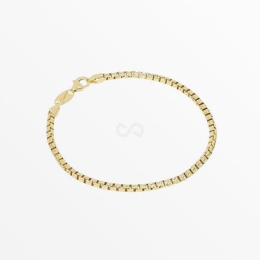 Wide box link bracelet with 18K gold plate in a full oval on white, etched square links, clasp and tag at upper left